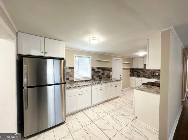 6069 Wisteria Ln, House other with 4 bedrooms, 2 bathrooms and null parking in Lithia springs GA | Image 4