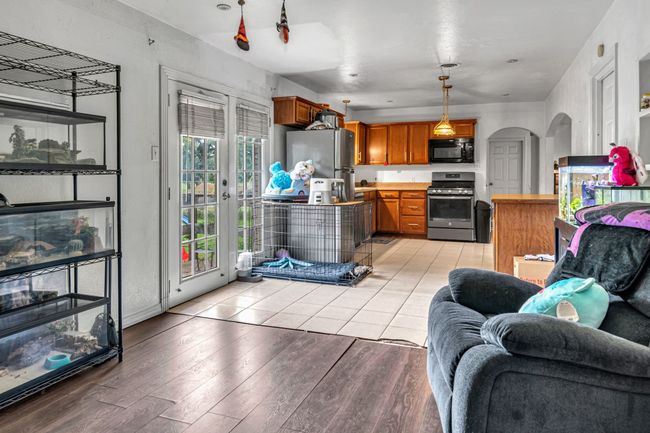 Natural Light Bathes The Ceramic-Tiled Dining Area. That's The Portable Island On The Right. | Image 9