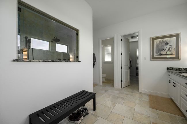 Primary Bathroom. Note the spa-shower window. | Image 17
