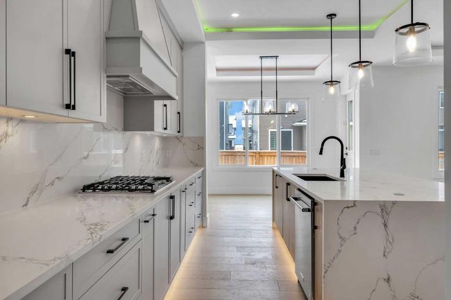 223 Kinniburgh Loop, House other with 4 bedrooms, 4 bathrooms and 5 parking in Chestermere AB | Image 21