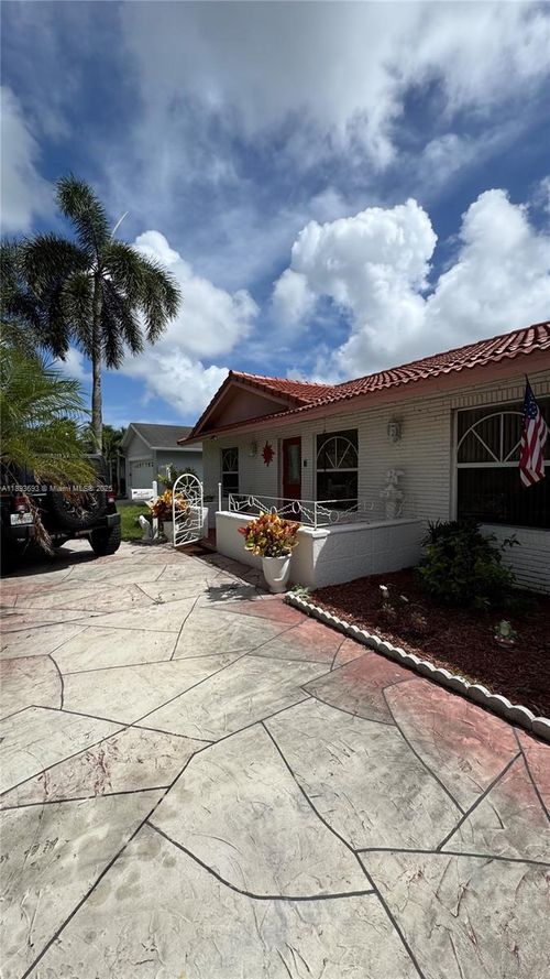 4390 Nw 4th Ct, Coconut Creek, FL, 33066-1725 | Card Image