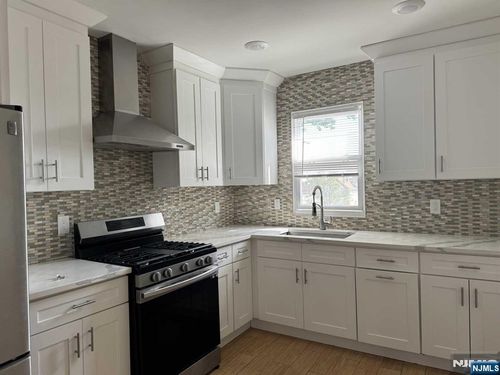 143 W 2nd St, Clifton, NJ, 07011-2409 | Card Image