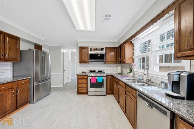 2267 Cassina Pointe Sw, House other with 4 bedrooms, 3 bathrooms and null parking in Marietta GA | Image 11