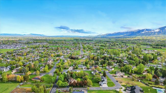 Aerial view of residential area with a mountainous background | Image 6