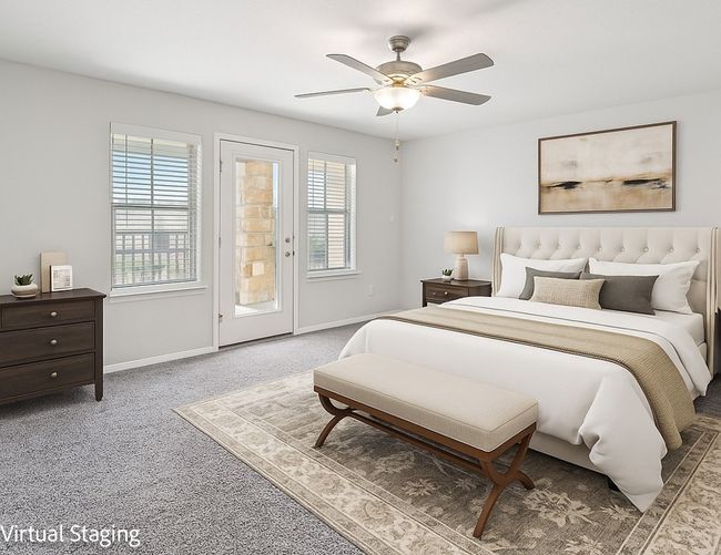 Bedroom with access to exterior, baseboards, carpet, and ceiling fan | Image 11