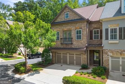 Welcome home to this brick end until townhome. | Image 1