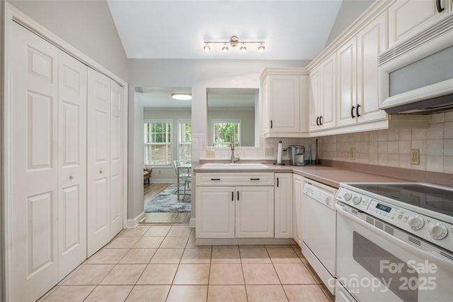 Laundry closet on the left | Image 13