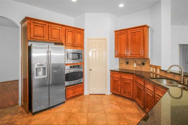 13204 Quiet Lake Ln, House other with 5 bedrooms, 4 bathrooms and 2 parking in Pearland TX | Image 9