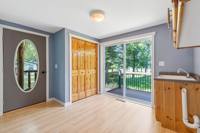 Large entry/foyer with washer/dry hookup ready for those sandy toes and towels! | Image 9
