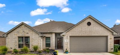 View of front of property featuring a garage | Image 1