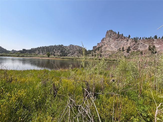 View of mountain background featuring a large body of water | Image 34