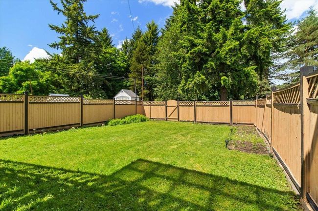View of yard with a fenced backyard | Image 36
