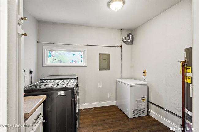 Storage/Laundry Across from Kitchen | Image 17