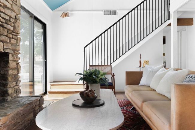 Living area with stairs, visible vents, and wood finished floors | Image 5