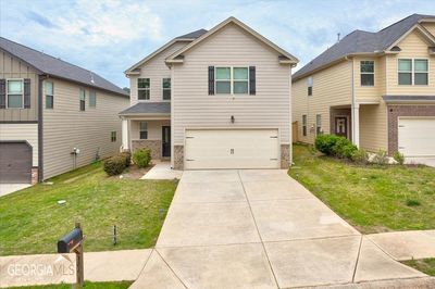 144 Emporia Loop, House other with 5 bedrooms, 3 bathrooms and 2 parking in Mcdonough GA | Image 1