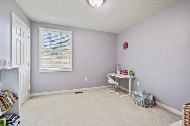 The fourth bedroom is currently used as a playroom. | Image 20
