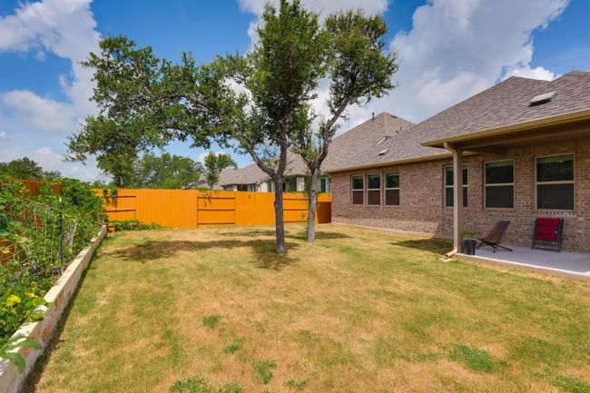 View of yard featuring a patio area | Image 34