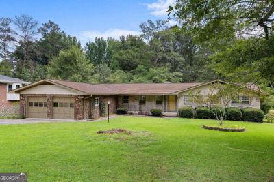 2975 Riviera Drive Nw, House other with 3 bedrooms, 2 bathrooms and 2 parking in Conyers GA | Image 2