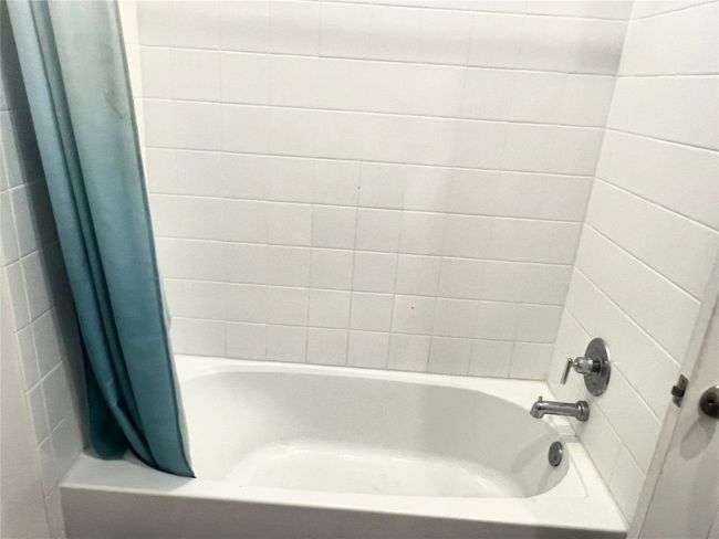 Bathroom with shower / bath combo | Image 16