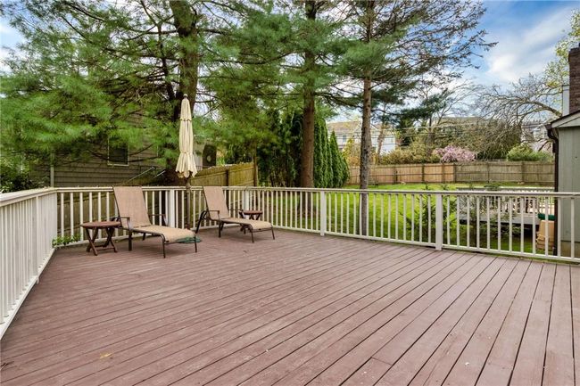 Large oversized deck leads to yard | Image 31