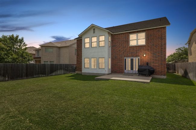 The back patio is the perfect place to entertain, dine outdoors, or unwind in the fresh air. | Image 22
