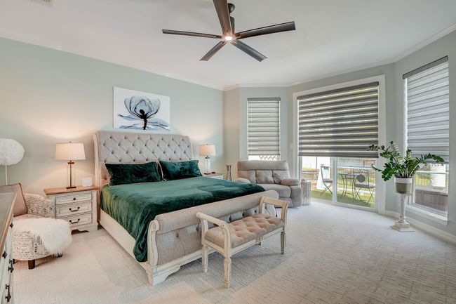 Primary ensuite offers access to a private patio | Image 12