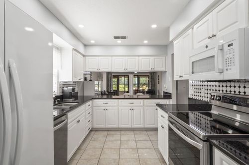 7715 Radcliffe Cir, PORT RICHEY, FL, 34668-5927 | Card Image