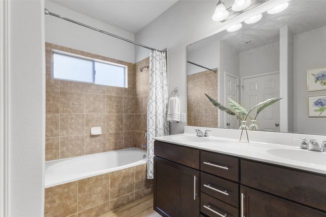 Full primary bathroom with shower/bath and double vanity | Image 14