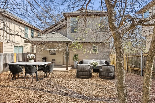 Virtually Staged: The backyard is perfect for lounging and entertaining. | Image 19