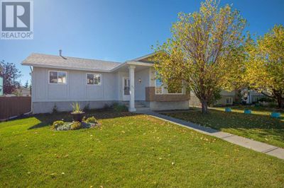 71 Quigley Dr, House other with 5 bedrooms, 3 bathrooms and 3 parking in Cochrane AB | Image 1