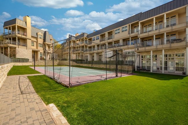 View of tennis court featuring community basketball court | Image 36