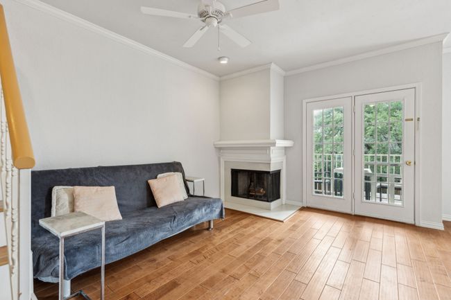 A wrap around wood burning fireplace | Image 8