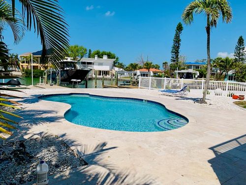 14162 W Parsley Dr, MADEIRA BEACH, FL, 33708-2353 | Card Image