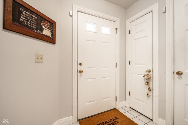 entryway featuring tile floors | Image 7