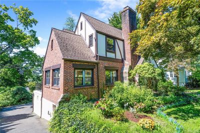 Architectural Gem Boasts Elaborate Ornamentation With Timeless Half-Timbered Brick And Stucco | Image 2