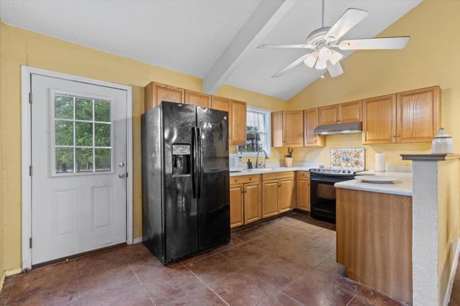 Kitchen with black appliances | Image 6