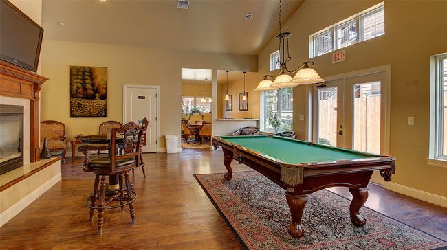 Clubhouse for Members includes, pool table, fooseball table, poker table, gym with mirror and nice sitting areas by the fireplace. | Image 37