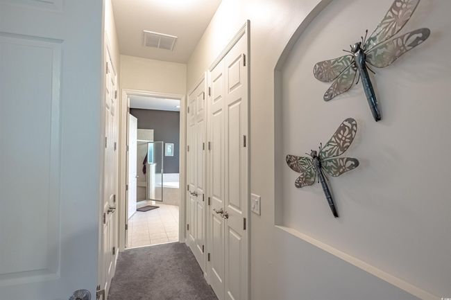 Corridor featuring dark tile patterned flooring | Image 27