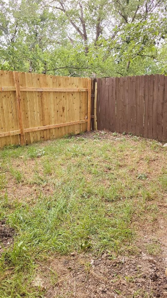 View of yard with fence | Image 28