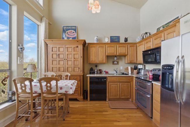 The kitchen is fully equipped with ample​​‌​​​​‌​​‌‌​‌‌​​​‌‌​​‌‌​‌​​​​​‌ storage. | Image 7
