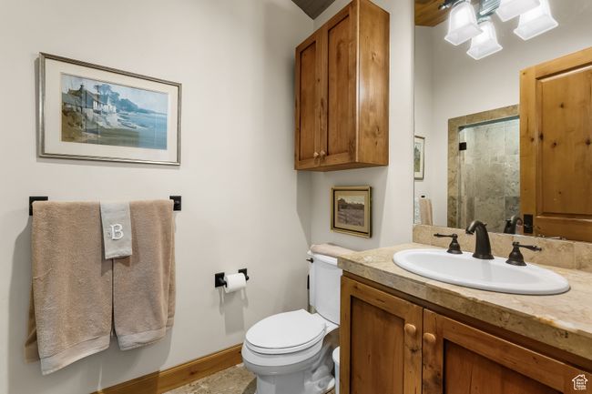 Powder room between dining and great room. | Image 44