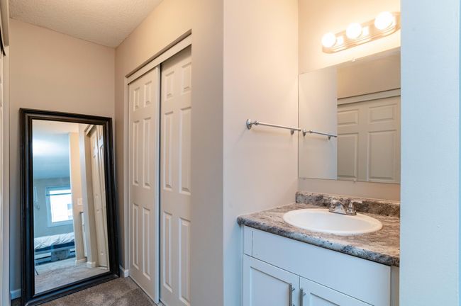 Owners bedroom with dual closets plus vanity.jpg | Image 10