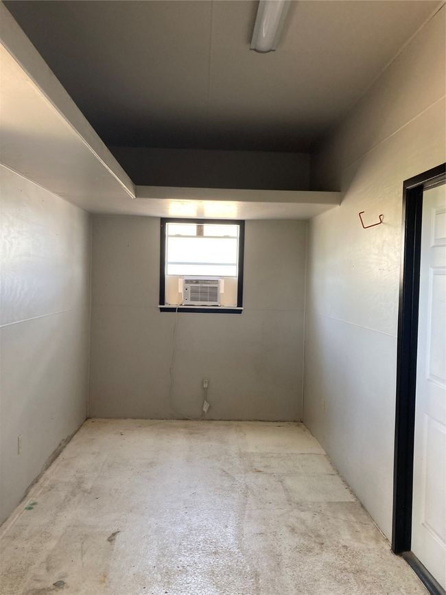 Below grade area featuring cooling unit | Image 10