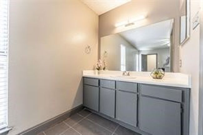 Bathroom featuring vanity and tile patterned flooring | Image 19