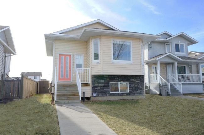 7114 114 Street, Home with 4 bedrooms, 2 bathrooms and 4 parking in Grande Prairie AB | Image 1