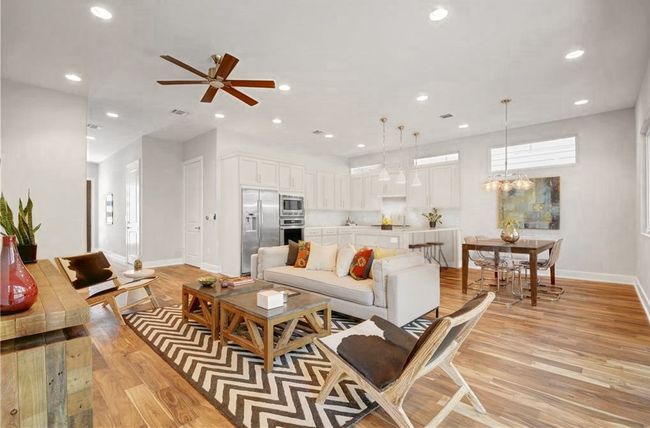 Living room with recessed lighting, baseboards, and light wood-style flooring | Image 4