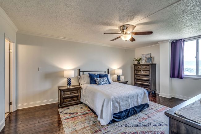 As you step into the primary bedroom, you'll be captivated by generous space it offers. This is not just a bedroom; it's a sanctuary designed for those who appreciate the finer things in life. | Image 11