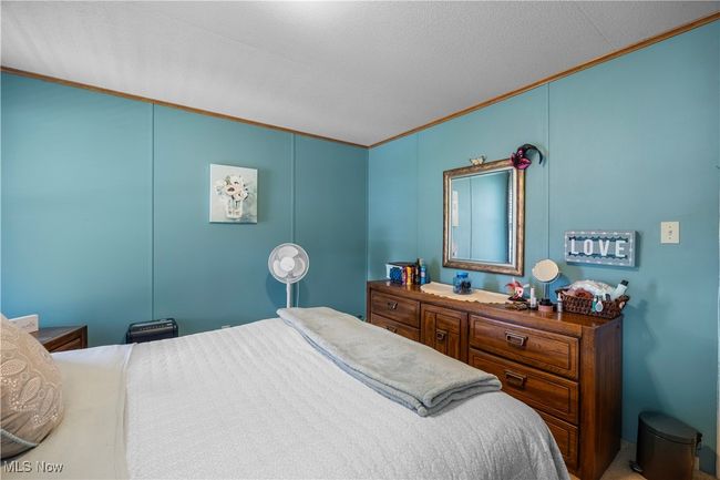 Bedroom with crown molding | Image 30