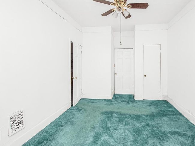 Unfurnished bedroom with visible vents, baseboards, a ceiling fan, and carpet floors | Image 14