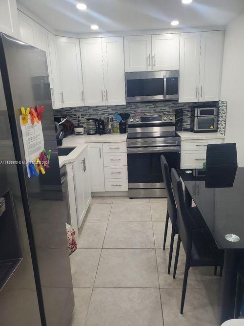 apt-1217-10777 Sample Rd, Coral Springs, FL, 33065-3772 | Card Image